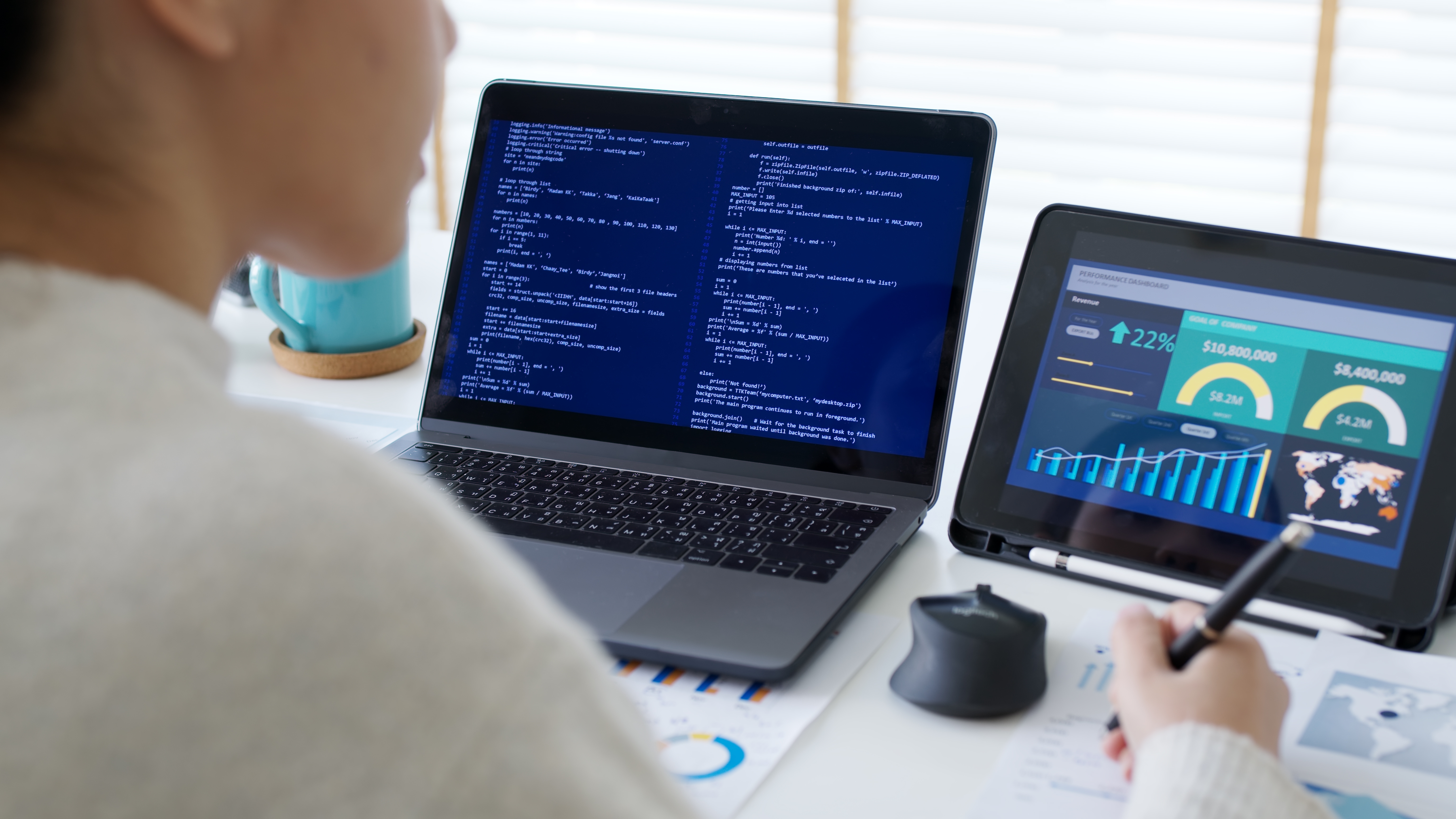 A young woman working at a laptop