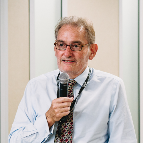 Photo of national statistician Professor Sir Ian Diamond, standing, with microphone, during a talk.